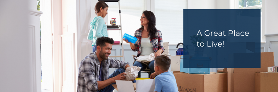 a family unpacking and setting in to their house